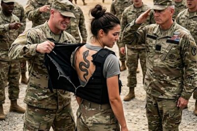 He grabbed the back of her training vest to embarrass her in front of the whole yard, tore the seam clean open, and the second that black viper mark showed, a decorated colonel snapped to attention and saluted the woman everybody had been mocking for days.